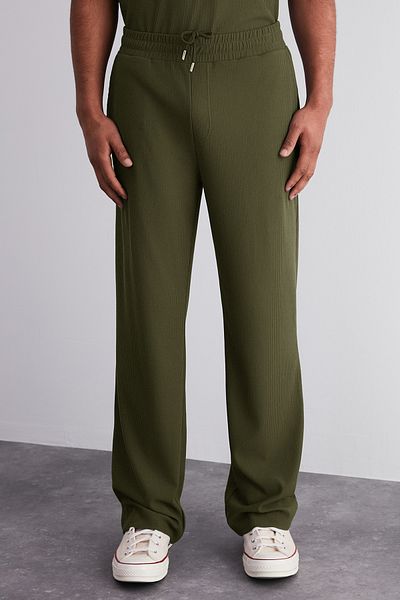 Trendyol Collection Einteilige, knitterfreie Khaki-Jogginghose in limitierter Auflage – weites Bein, verstecktes Kabel TMNSS23EA00013