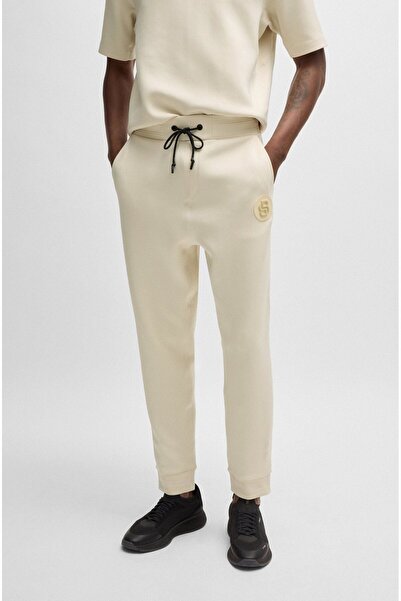 BOSS Men's Ecru Trousers - Elastic and Rope-Tied,50521382-131