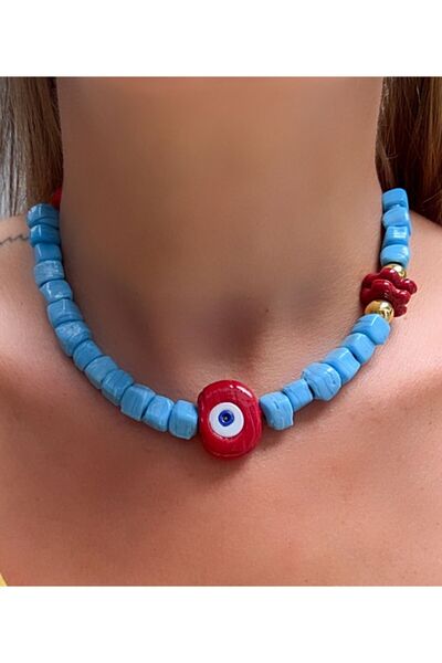 Kutcha Accessories قلادة يد على شكل عين العجل مزينة بالخرز من بودروم