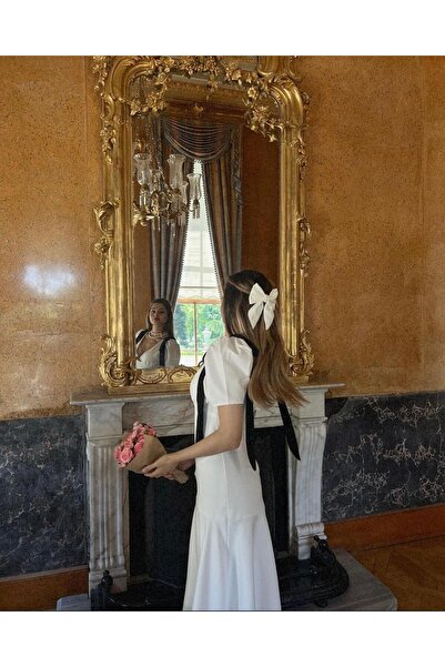 FMN Moda Široká sukně s výstřihem do V - Mašle a prošívání