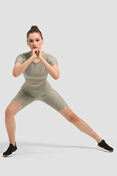 Superstacy Спортивні лосини з кишенями на колінах, відкритого зеленого кольору