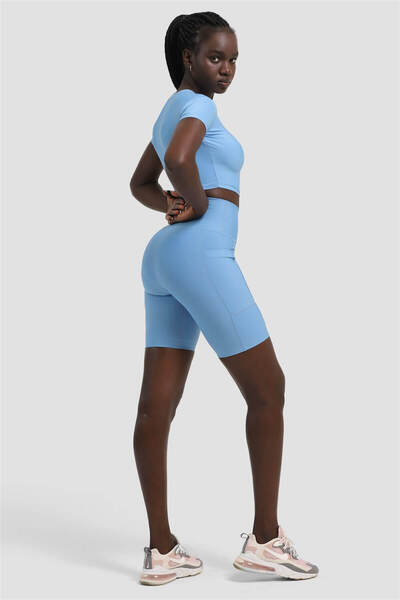 Superstacy Сині спортивні лосини з кишенями на колінах