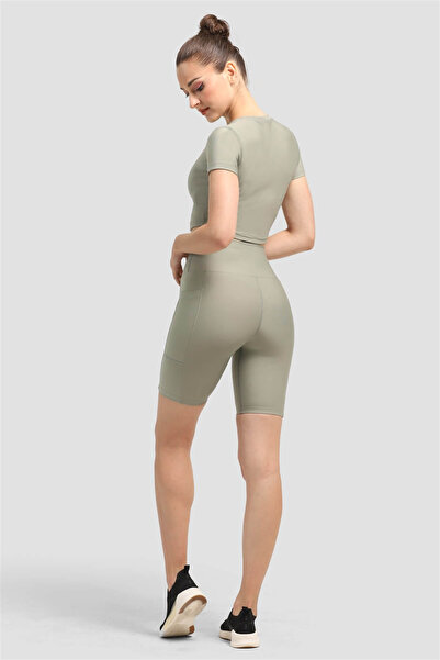 Superstacy Спортивні лосини з кишенями на колінах, відкритого зеленого кольору