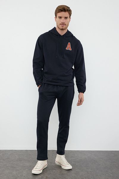 Trendyol Collection Μαύρο Σετ φόρμας Oversize/Wide Cut με κουκούλα γράμμα κέντημα TMNAW25EM00007