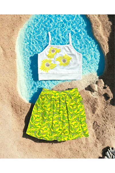 LİTTLE TORTOİSE طقم بناتي - توب قصير بنمط زهرة الأقحوان اللامعة وتنورة شورت م...