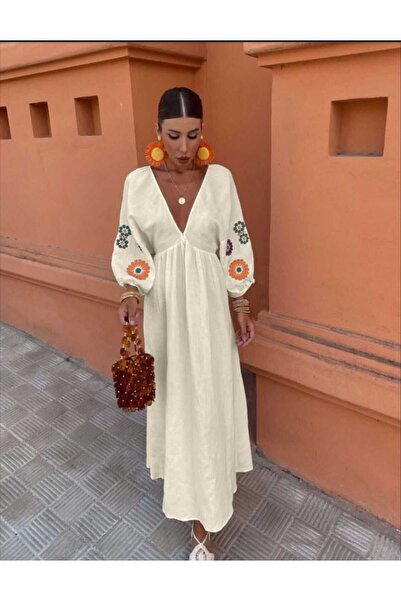 Butik Şenel V yaka kolları nakışlı keten elbise