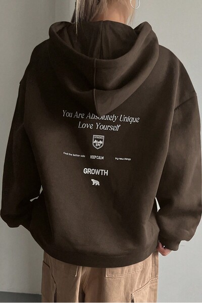 MODAGEN Unisex hnědá mikina s kapucí a potiskem na zádech Calm Love Yourself Oversize