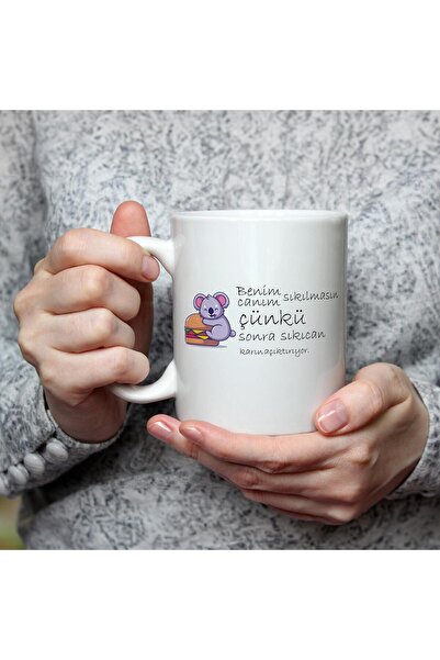 Kırtasiye Ofisi كوب أبيض مطبوع عليه "أنا عزيزي لا تشعر بالملل لأن الحياة مشدو...