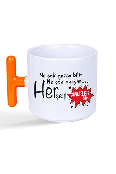 Kırtasiye Ofisi كوب برتقالي مطبوع عليه عبارة "كيف يذهب كثيرًا ويقرأ كثيرًا