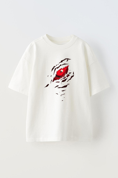 THEWERT Bela Oversize kroj Unisex T-shirt - Crveno oko i helikopter Štampano ...