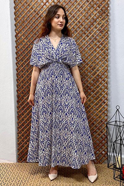 Moda Gülse فستان طويل بياقة مزدوجة الصدر وطبعة زهور ملونة