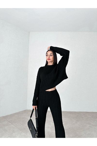 munora butik بدلة سوداء بتفاصيل محبوكة