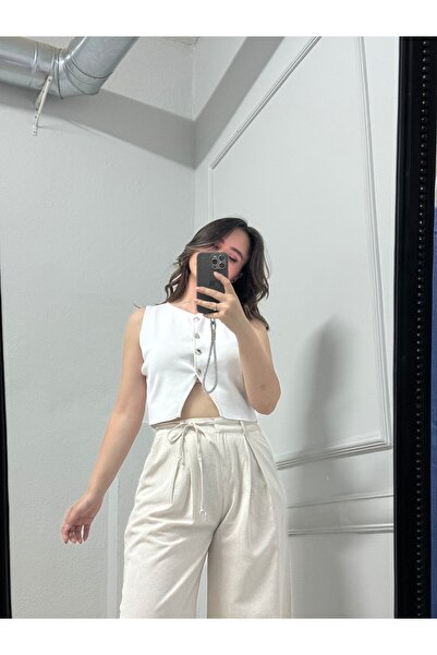 TUĞÇE ŞEN BUTİK Beyaz önden düğmeli triko yelek