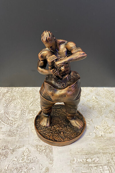 Tasarloxi Kendini Yontan Adam Biblo