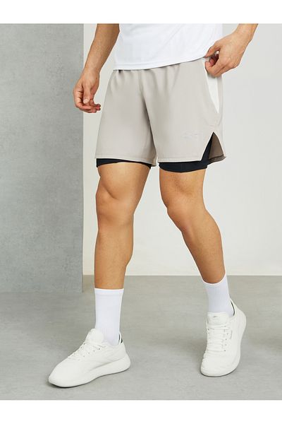 Reebok شورت جري 2in1 بلوحة جانبية مخططة