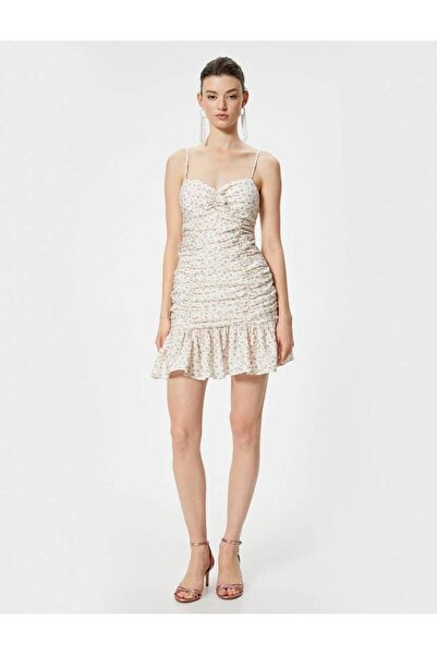 Koton Μίνι φλοράλ φόρεμα με βολάν με λεπτές τιράντες και λεπτομέρεια με φιόγκο