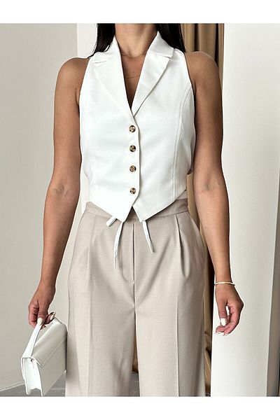 Laluvia Ecrufarbene Weste mit Bindeband auf der Rückseite – Cut-Out-Detail