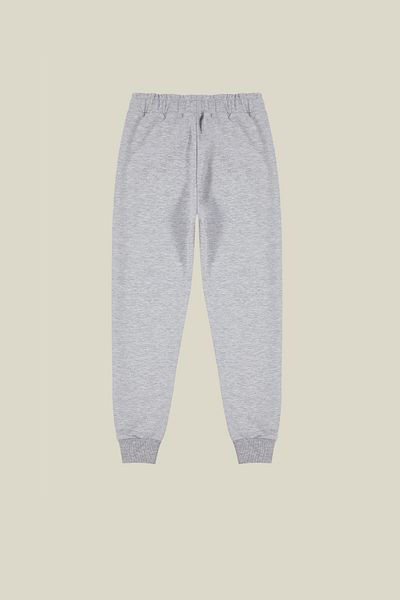 TRENDYOLKIDS Unisex šedé šněrovací tepláky s kapsami - TKDAW25EA00000