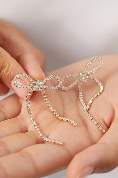 Elika Silver Waterway Bow Model Earrings