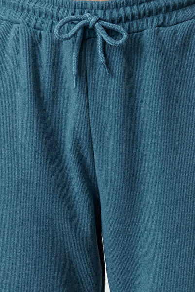 Trendyol Collection Comfortable Fit - Petrol Thessaloniki Knitted Sports Sweatpants with Pockets - TWOAW21EA0168