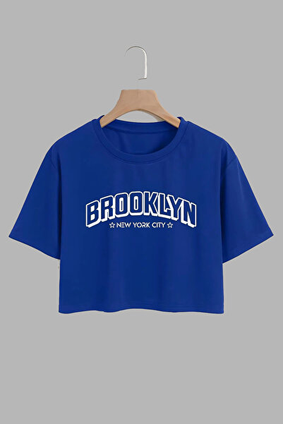 THEWERT بلوزة قصيرة قطنية مطبوعة بتصميم بروكلين للجنسين - مقاس كبير باللون ال...