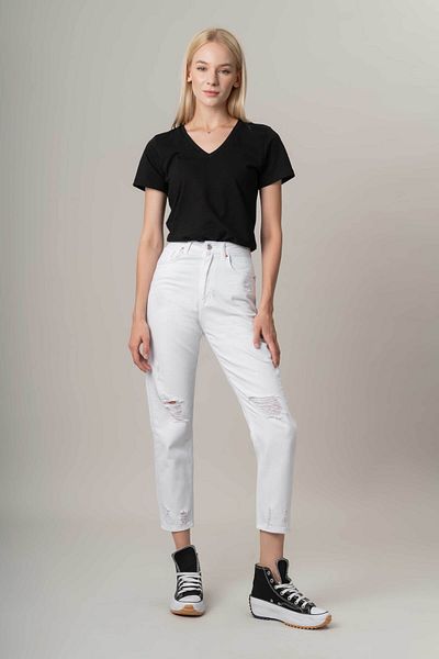 its basic Women's White Color 100% Cotton Ripped at the Knee Mom Fit Denim Trousers