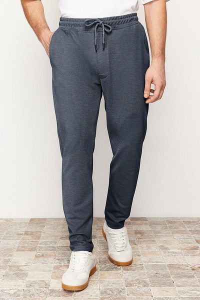 Trendyol Collection Sötétkék Jogger Fit elasztikus derékkötő texturált kötött kényelmes nadrág TMNSS24PL00007