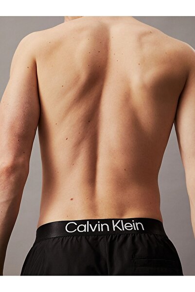 Calvin Klein Erkek Çabuk Kuruyan Kumaşlı Normal Kesim Siyah Deniz Şortu KM0KM00945-BEH