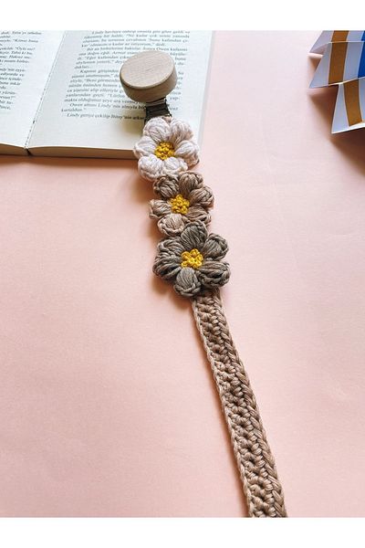 The Cloudish Shop hand-knitted baby flower pacifier strap with pacifier chain flower detail