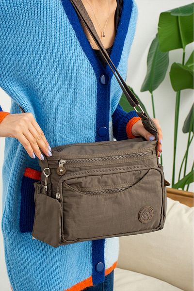 MEGA ÇANTA Poștaș rezistent la apă Kılinkır - Geantă crossbody cu buzunar și detaliu portofel