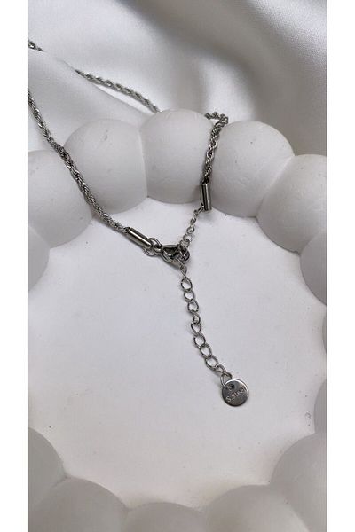 Accessories قلادة فضية بأحرف فولاذية حرف T