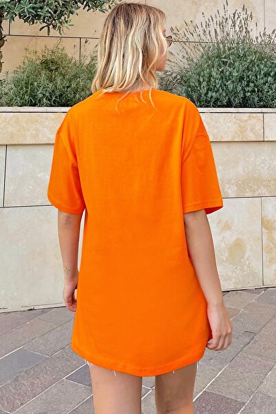 Swist Pomarańczowa koszulka damska oversize z nadrukiem Atlanta
