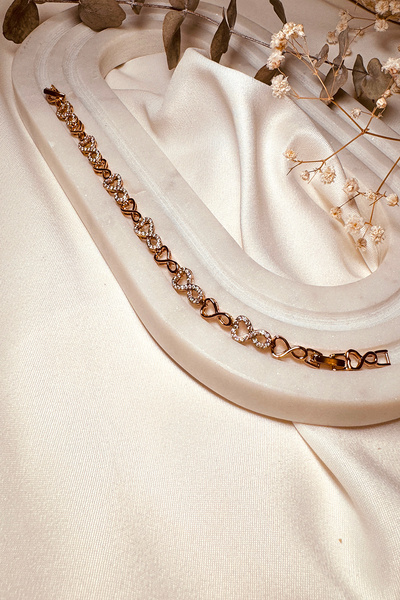 MOONİ ACCESSORİES سوار نسائي ذهبي اللون إنفينيتي موديل Xuping مجموعة خاصة