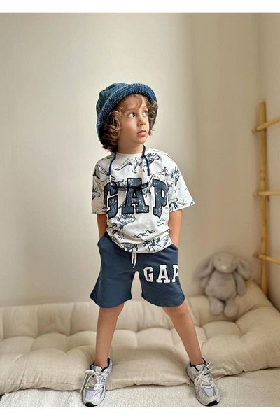 GAP Baby طقم شورت للأولاد بطبعة ديناصور