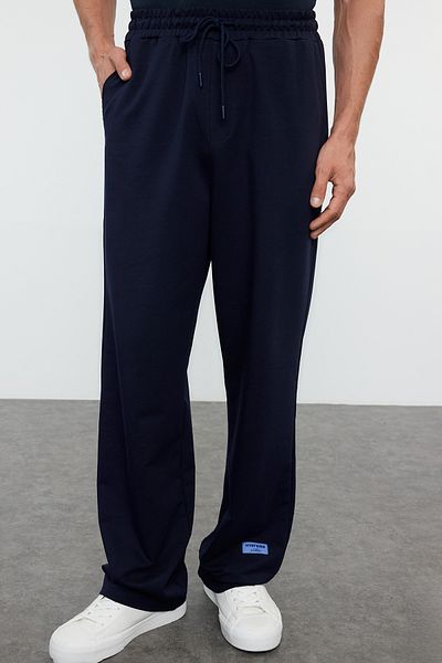 Trendyol Collection Marineblaue, übergroße Jogginghose mit Etikett – Beinabschluss mit elastischem Bund TMNSS24EA00006