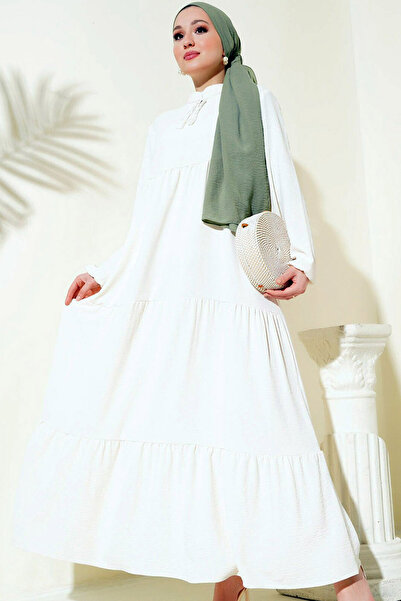 CoolLook Püskül Detaylı Hakim Dik Yaka Lastikli Uzun Balon Kollu Bol Kesim A-Line Maksi Boy Tesettür Elbise