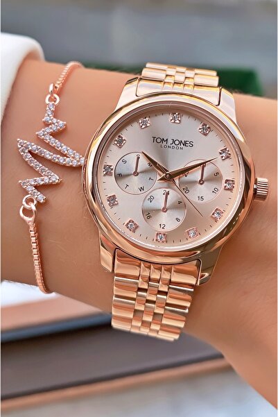 Tom Jones ساعة يد نسائية بلون ذهبي وردي - هدية سوار