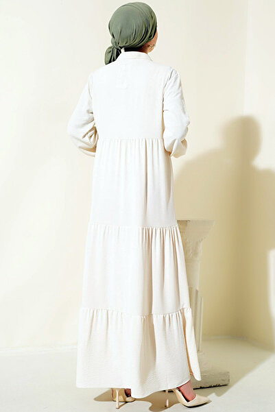 CoolLook Püskül Detaylı Hakim Dik Yaka Lastikli Uzun Balon Kollu Bol Kesim A-Line Maksi Boy Tesettür Elbise