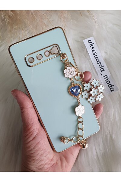 Aksesuarda Moda Samsung S10 Uyumlu Çiçekli El Geçmeli Gold Detaylı Lazer Kesi...