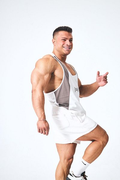 FAST EFFECT WEAR قميص داخلي بشريط مطبوع من الأمام - تفاصيل مخططة