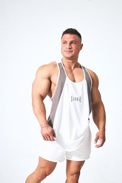 FAST EFFECT WEAR قميص داخلي بشريط مطبوع من الأمام - تفاصيل مخططة