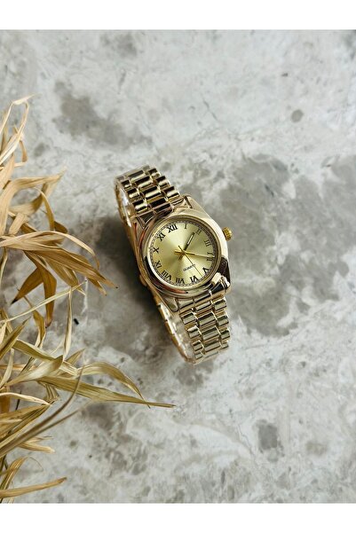 İnogge ساعة يد نسائية دائرية من الفولاذ باللون الذهبي