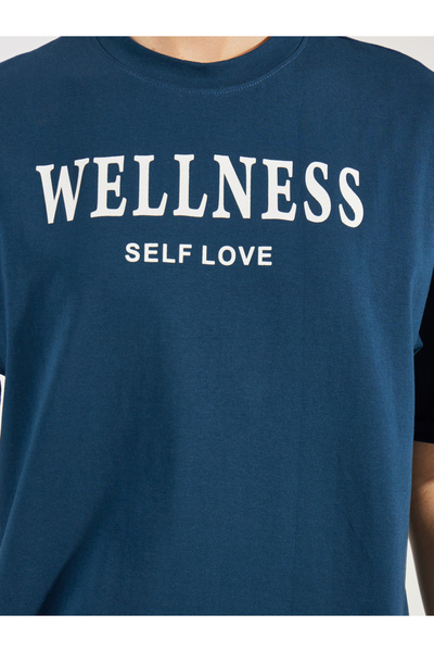 Styli Oversized Slogan Print Round Neck Drop Shoulder T-Shirt