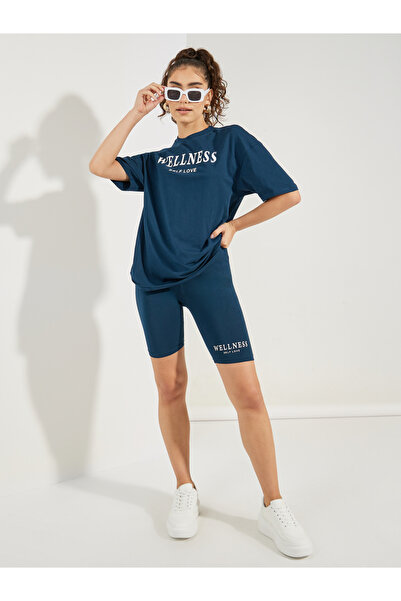 Styli Oversized Slogan Print Round Neck Drop Shoulder T-Shirt