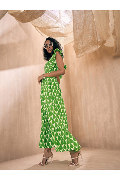 Sassafras By Styli All Over Print Tie-Up Back A-Line Maxi Dress