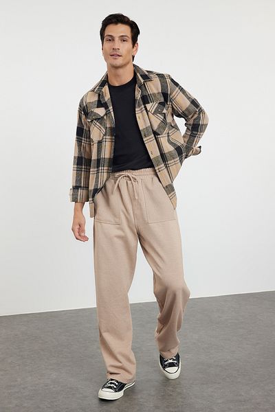 Trendyol Collection Mink Oversize/Wide Cut Pocket Textured Fabric Detaillierte Open Leg Sweatpants TMNAW24EA00025