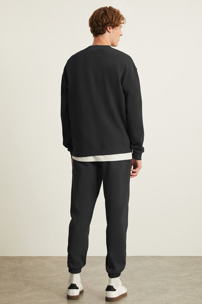 GRIMELANGE Σετ ανδρικής φόρμας EITAN με 3 νήματα, κανονική εφαρμογή, στρογγυλή λαιμόκοψη, μαύρη φόρμα με ελαστικά πόδια