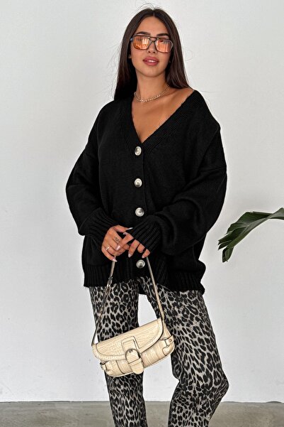 FEMELLE Black Oversize Knitwear Cardigan - Double Pocket and Button Detail, Off-Shoulder