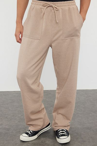 Trendyol Collection Mink Oversize/Wide Cut Pocket Textured Fabric Detaillierte Open Leg Sweatpants TMNAW24EA00025
