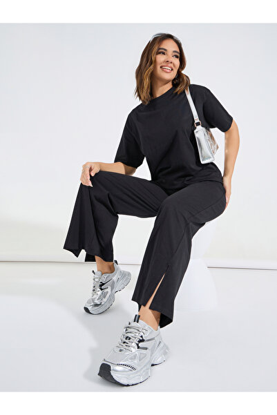 Styli تي شيرت كبير الحجم طويل الخطوط وبنطلون رياضي واسع الساق